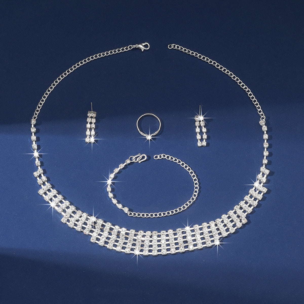 Claw Chain Necklace Bracelet Earrings Four-piece Ring Set