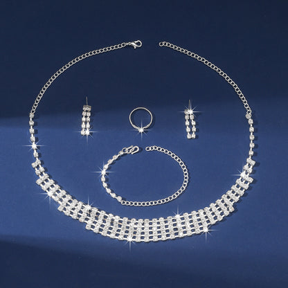 Claw Chain Necklace Bracelet Earrings Four-piece Ring Set